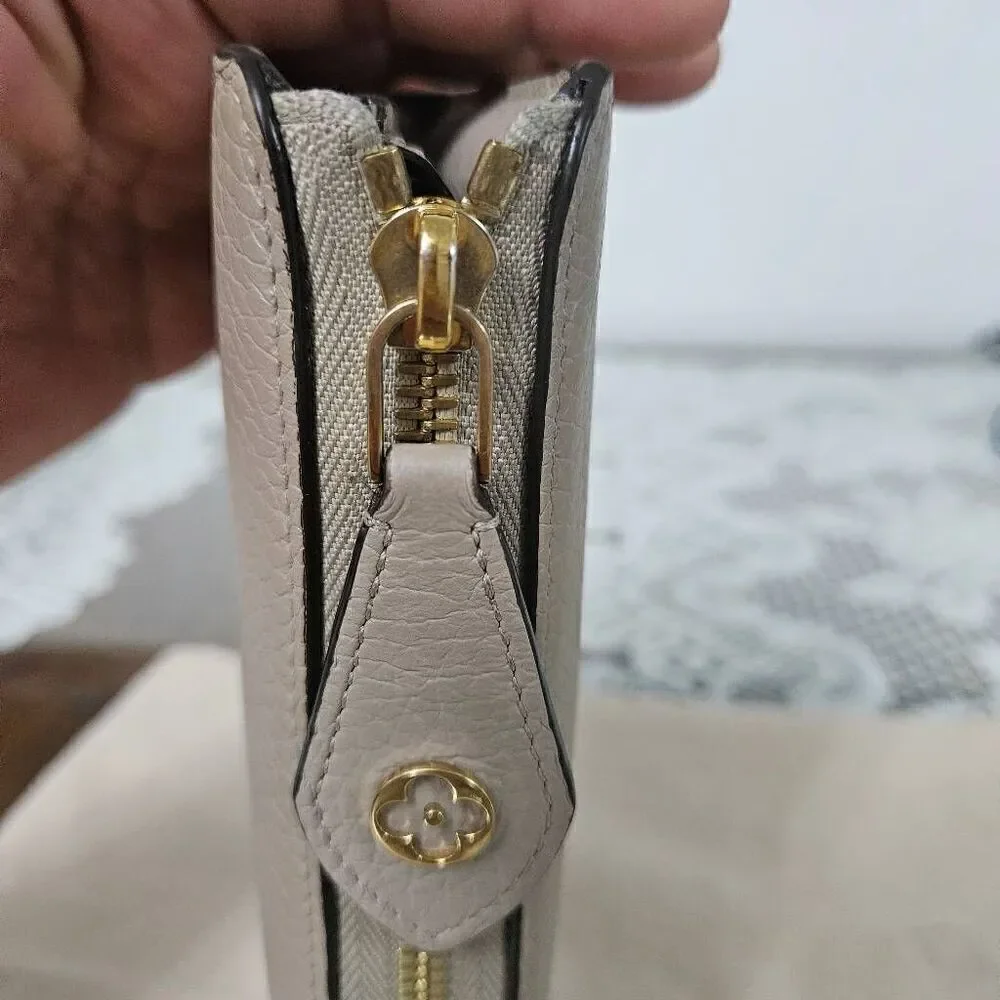 Louis Vuitton Taurillon portefeuille Comete long zip wallet